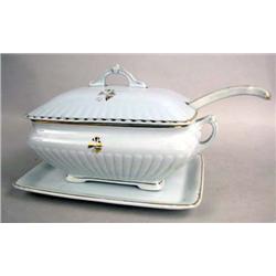 A GILT-DECORATED IRONSTONE TUREEN, UNDERPLATE, AND LADLE