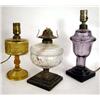 Image 1 : A GROUP OF THREE ASSORTED FLUID LAMPS