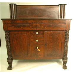 A LATE FEDERAL BRASS- INLAID CARVED AND FIGURED MAHOGANY SIDEBOARD