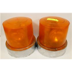 LOT OF 2 AMBER ROTATING LIGHTS, ONE HAS CRACK IN