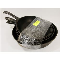 SET OF 5 CAST IRON FRYING PANS.