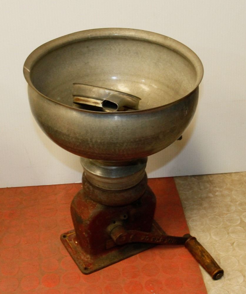 ANTIQUE CREAM SEPARATOR. Kastner Auctions