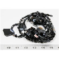 BAG OF POLISHED ROCK BEADS WITH LARGE STONE BEADS