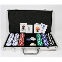 POKER SET IN A SUITCASE. HEAVY CHIPS, ABOUT 300