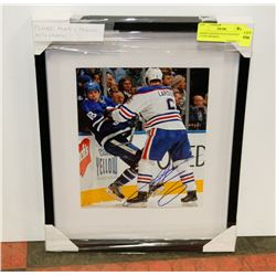 ADAM LARSSON AUTOGRAPHED PHOTO FRAMED.