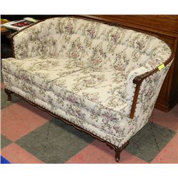 60" FLORAL PATTERN FABRIC LOVESEAT.