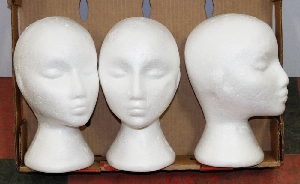 FLAT OF STYROFOAM FEMALE MANNEQUIN WIG HEAD