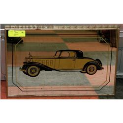 CADILLAC MIRRORED ADVERTISMENT.