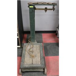 ANTIQUE FAIRBANKS SCALE WITH WEIGHTS.