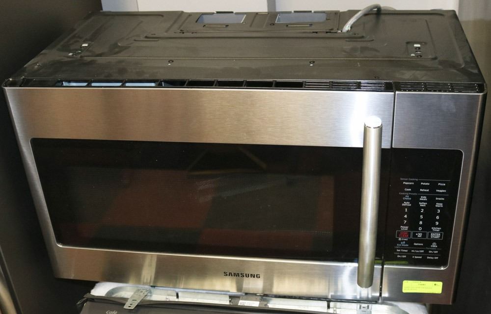 SAMSUNG OVER THE RANGE MICROWAVE. Kastner Auctions