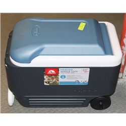 IGLOO COOLER W/ WHEELS, COLEMAN QUICK-LITE HEATER.