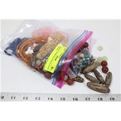 BAG OF ASSORTED STONE & GLASS BEADS