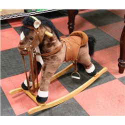 LARGE BROWN ROCKING HORSE