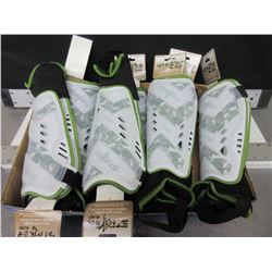 7 New pairs of Striker Soccer Shin Guards / ages 6-12