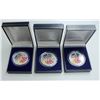 Image 1 : THREE COLORIZED AMERICAN SILVER EAGLE