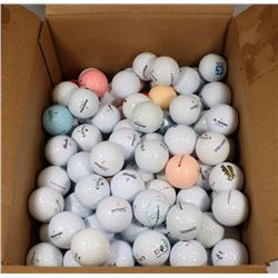 ONE BOX WITH USED GOLF BALLS.