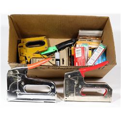 BOX WITH STAPLER AND STAPLES.