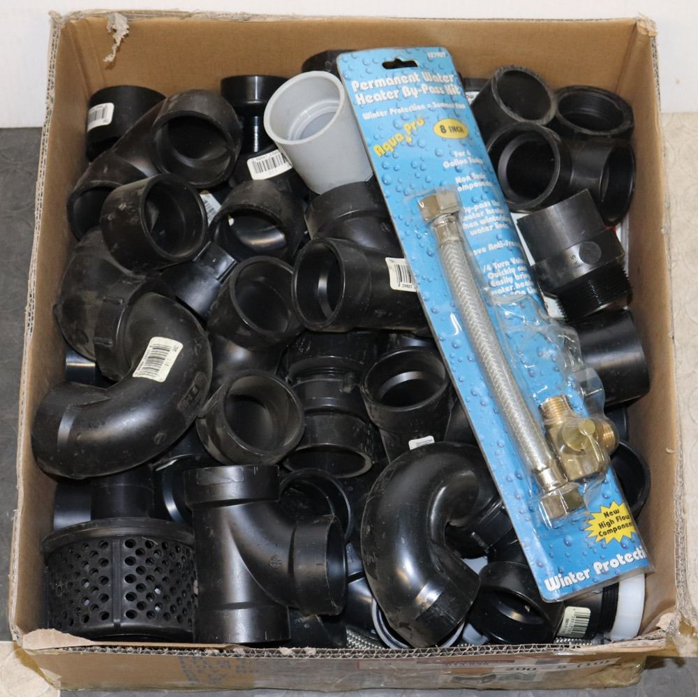 BOX OF PLUMBING ITEMS.