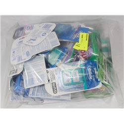 BAG OF ASSORTED FLOSS AND DENTAL PRODUCTS