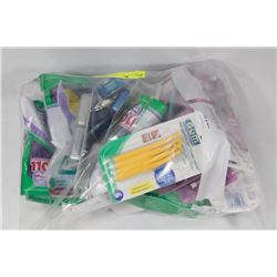 BAG OF ASSORTED FLOSS AND DENTAL PRODUCTS