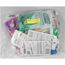 BAG OF ASSORTED FLOSS AND DENTAL PRODUCTS