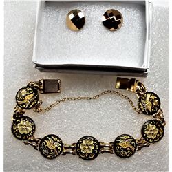 12)  GOLD TONE & BLACK ENAMEL