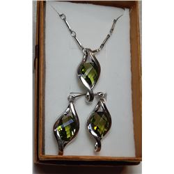 14)  PERIDOT GREEN BRIOLETTE CUT