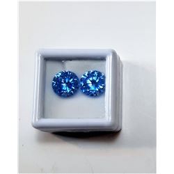 10)  LOT OF 2 MATCHED ROUND OCEAN