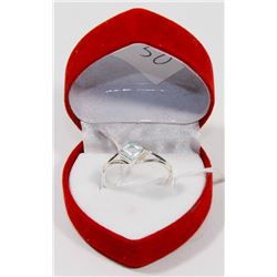 #50-BLUE CZ RING SIZE 7.5