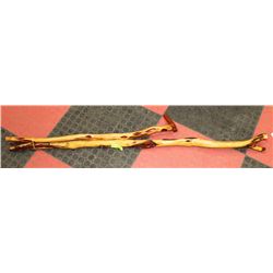 TWO HAND CARVED WALKING STICKS.