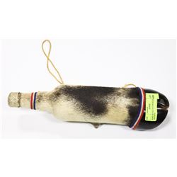 BOTTLE IN COW HOOF