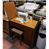 Image 1 : SINGER SEWING MACHINE IN CABINET.