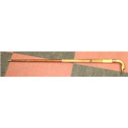 WOODEN CANE WITH GOLD COLORED GOOSE HANDLE