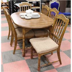 WOOD DINING TABLE WITH LEAF AND 6 CHAIRS.