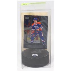 JORDAN EBERLE AUTOGRAPHED CARD & PUCK HOLDER.
