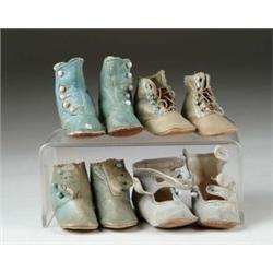 FOUR PAIR OF BLUE DOLL SHOES