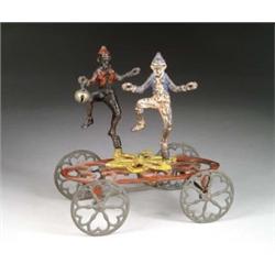 “THE ACROBATS” BELL TOY