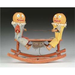 PUMPKINS ON MECHANICAL SEESAW