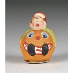 BOY IN PUMPKIN CANDY CONTAINER