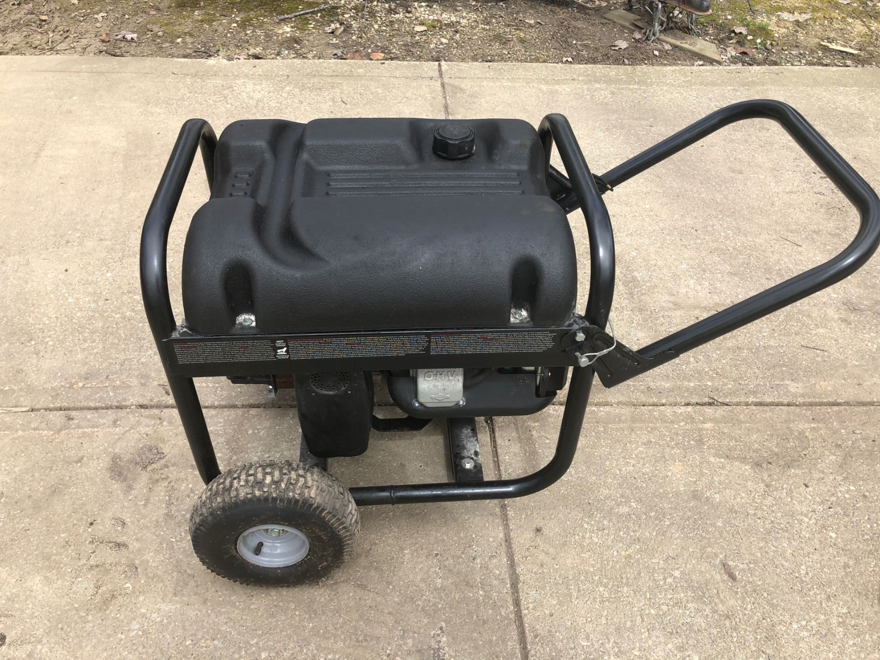 COLEMAN POWERMATE PORTABLE GENERATOR/ON WHEELS