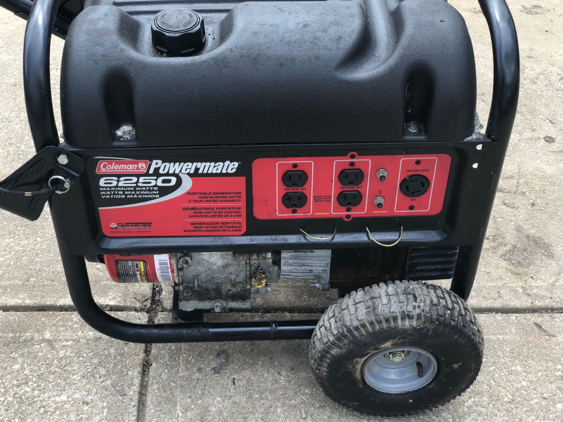 COLEMAN POWERMATE PORTABLE GENERATOR/ON WHEELS
