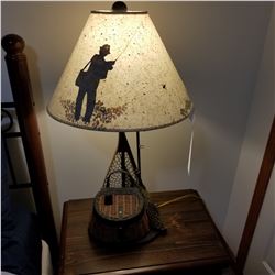 TABLE LAMP DEPICTING FLY FISHING.