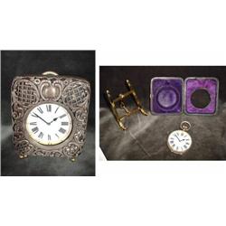 SWISS LEVEL AND DAY TABLE CLOCK UNSIGNED WITH CARRYING CASE WITH BRASS FILAGREE LAID OVER WOOD. BEVE