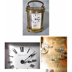 TIFFANY OVAL CARRIAGE CLOCK WITH SWISS LEVEL ESCAPEMENT. CIRCA 1920'S. TIME AND ALARM. 6"X3.5"X2.75"