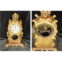 WATERBURY GILDED POT METAL 8 DAY TIME AND STRIKE MANTEL WITH LOWER CIRCULAR BEVEL GLASS PORTAL; PERF