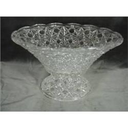 PRESSED GLASS PEDESTAL FRUIT BOWL IN THE DAISY BUTTON PATTERN. 6"X10.5".