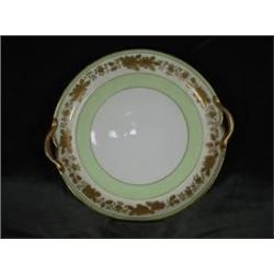 NIPPON HAND PAINTED FLORAL AND BORDERED PLATE WITH HANDLES. 8.75".