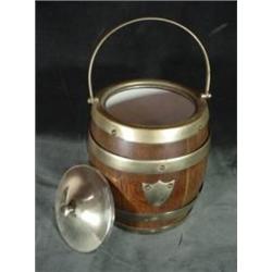 WOODEN HUMIDOR FASHIONED AFTER A BARREL WITH BRASS HARDWARE INCLUDING LID, BARREL RINGS, AND HANDLE 