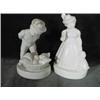 Image 1 : PAIR OF PORCELAIN FIGURINES, A BOY AND A GIRL IN A BONE COLORED PORCELAIN.  MARKED ON BOTTOM. 6"X3.5