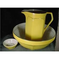 ACME, ENGLAND THREE PIECE WASHSTAND SET INCLUDING LARGE YELLOW BOWL WITH BLACK ACCENTS 6"X15", A MAT
